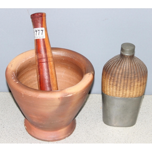 1777 - Pestle & mortar, approx 20cm diam. and a pewter and wicker drinking flask