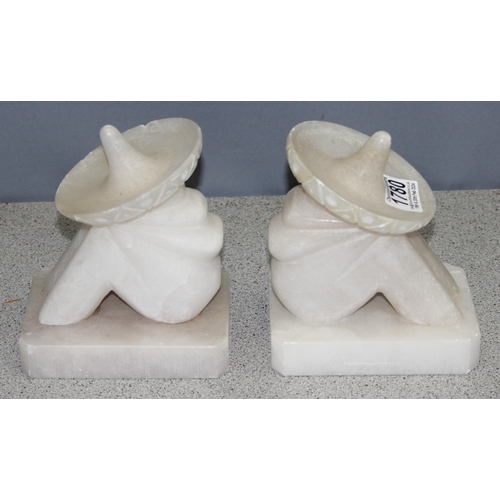 1780 - Pair of carved alabaster bookends of resting Mexican men with sombrero, approx 16cm tall