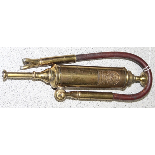 690 - A 19th century S. Maw & Son brass medical pump and attachments in original mahogany case