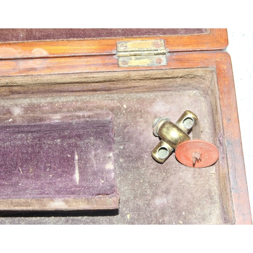 690 - A 19th century S. Maw & Son brass medical pump and attachments in original mahogany case