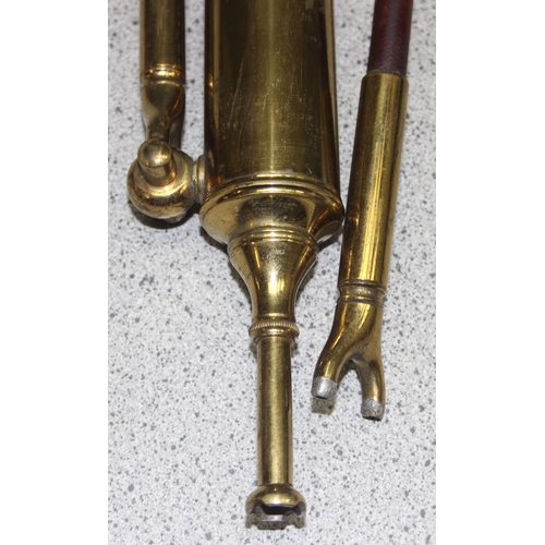 690 - A 19th century S. Maw & Son brass medical pump and attachments in original mahogany case