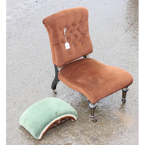 191 - A 19th century button back nursing chair with brown upholstery and ebonised legs and an unusual dome... 