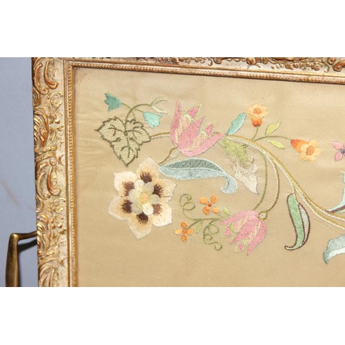 289 - Serving tray comprised of a glazed embroidery with gilt-frame edging, approx 55 x 35cm