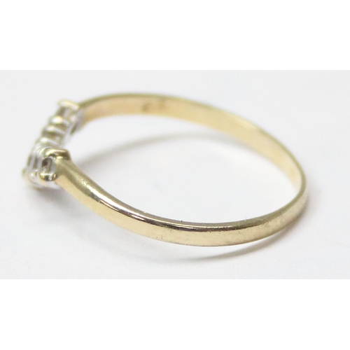 1172 - A 9ct gold wishbone ring set with white stones, approx size N, approx 1.03g gross