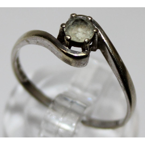 1171 - 9ct white gold and solitaire white stone ring in crossover setting, marked and XRF confirmed, approx... 