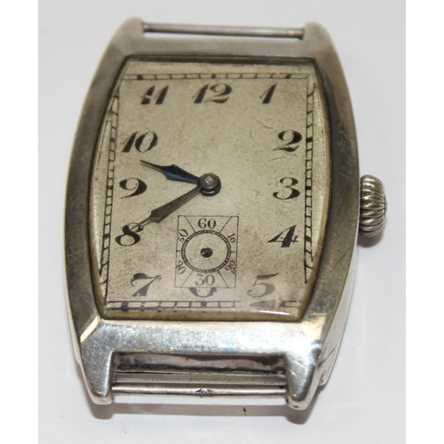 1308 - An Art Deco period silver cased cushion faced wristwatch, import marks for London 1926, movement unm... 