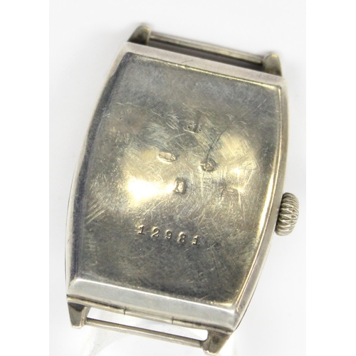 1308 - An Art Deco period silver cased cushion faced wristwatch, import marks for London 1926, movement unm... 