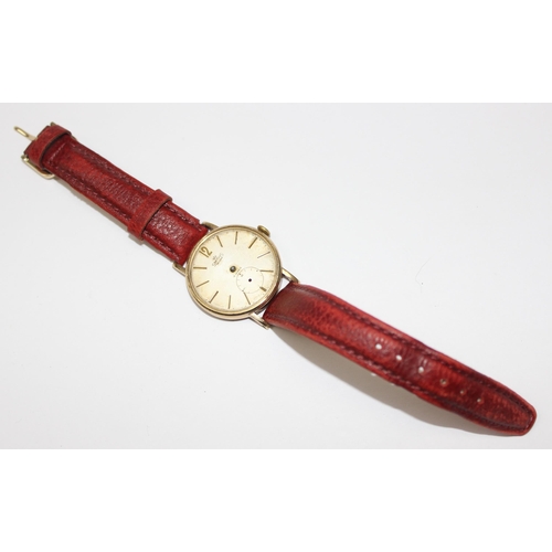 1314 - 9ct gold cased Smiths De Luxe wristwatch with leather strap, case marked for London date letter obsc... 