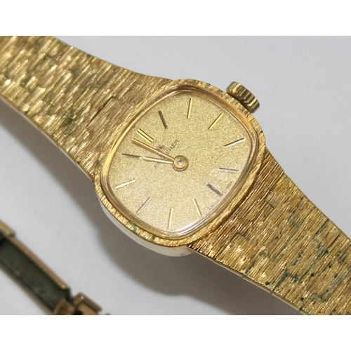 1328 - A vintage gold plated ladies Bucherer cocktail watch and a gold plated Timex watch