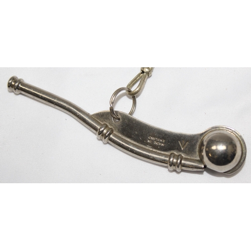 1413 - A military marked Bosun's Whistle and chain, Royal Navy