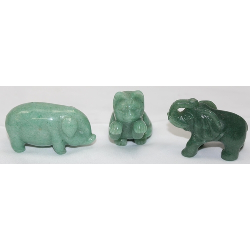 1604 - 3 small carved green hardstone animals, possibly Jade, Elephant, Pig and Cat, the largest approx 60m... 