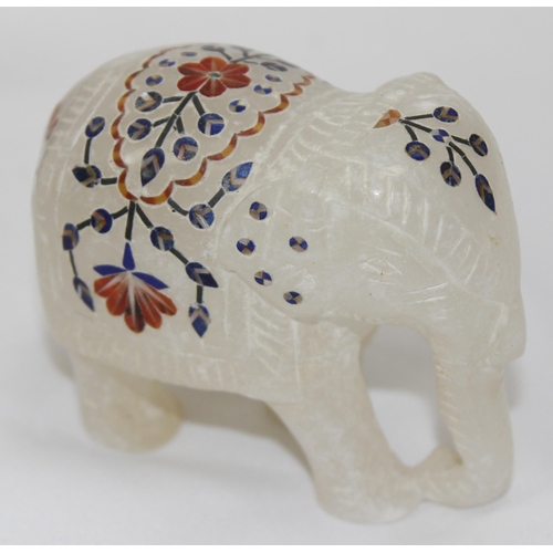 1605 - An Indian white marble and pietra dura inlaid model of an elephant and a further enamel model of a H... 