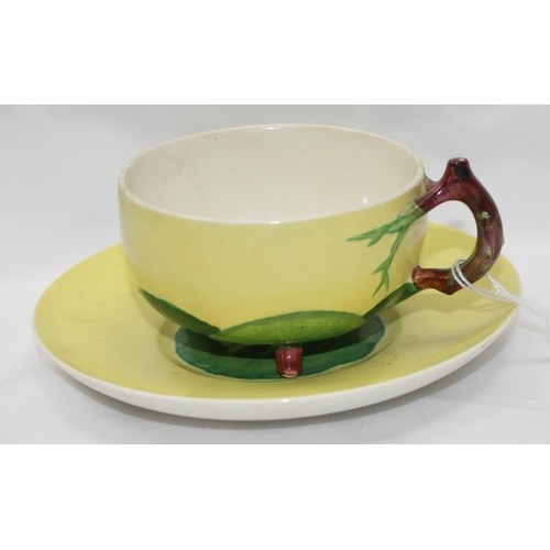 1606 - A rare Minton Majolica lily pad cup and saucer retailed by John Mortlock, date code to saucer for 18... 