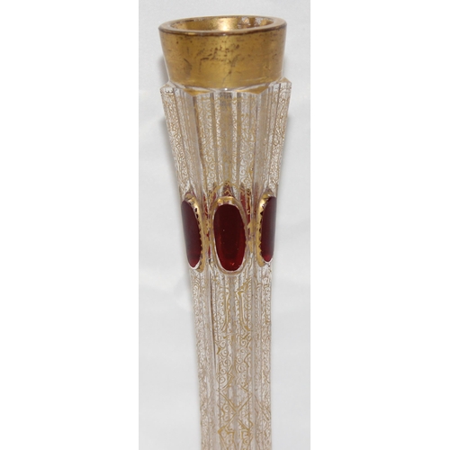 1620A - An interesting early 20th century glass bud vase with applied ruby glass cabochons and gilt decorati... 