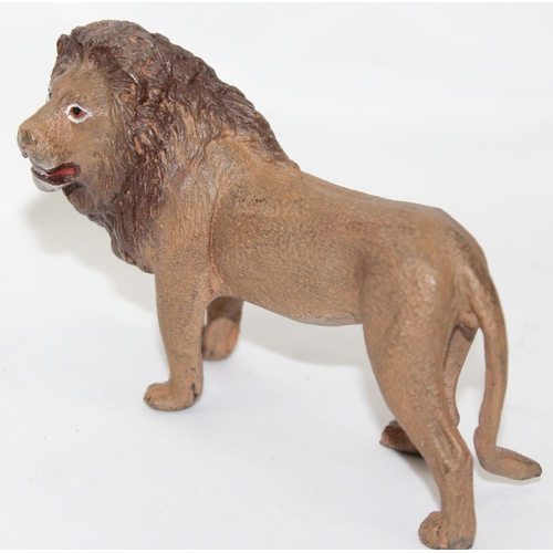 1695 - A Bergmann style cold painted metal model of a standing lion, amphora with B mark to base, approx 10... 