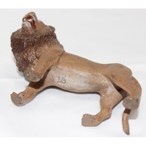 1695 - A Bergmann style cold painted metal model of a standing lion, amphora with B mark to base, approx 10... 