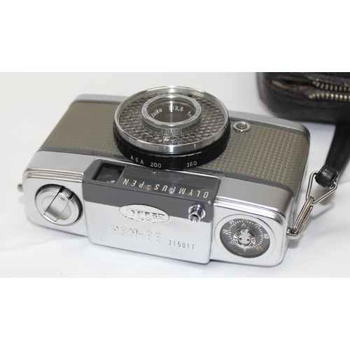 660 - A vintage Olympus Pen EE 35mm camera with Olympus D Zuiko 1:3.5 f=2.8cm lens, with soft leather case