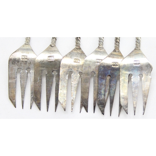 1013 - A set of 6 small 800 silver forks with figured terminals, possibly Thai, marked and XRF confirmed, a... 