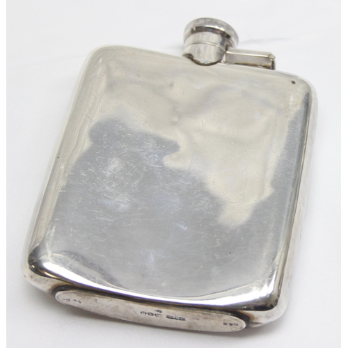 1036 - A vintage silver 3/4 pint hip flask of plain design, Sheffield 1944 by James Dixon & Sons, approx 13... 