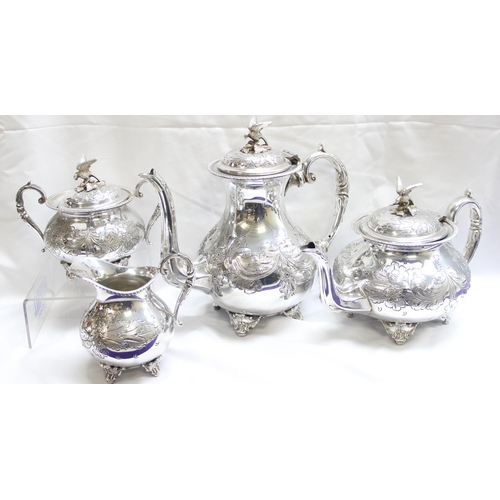 1056 - A highly decorated antique 4 piece silver-plated tea set to include tea pot, hot water jug, sugar an... 