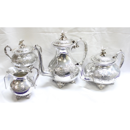 1056 - A highly decorated antique 4 piece silver-plated tea set to include tea pot, hot water jug, sugar an... 