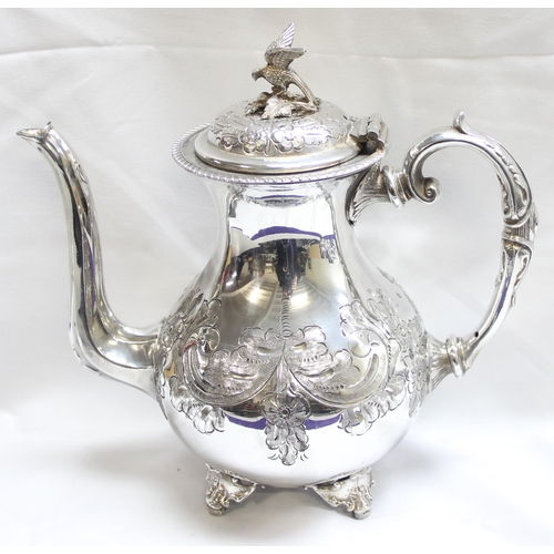 1056 - A highly decorated antique 4 piece silver-plated tea set to include tea pot, hot water jug, sugar an... 