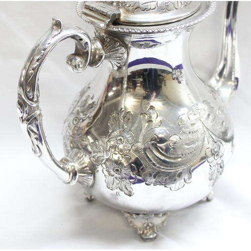 1056 - A highly decorated antique 4 piece silver-plated tea set to include tea pot, hot water jug, sugar an... 