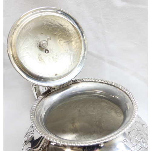 1056 - A highly decorated antique 4 piece silver-plated tea set to include tea pot, hot water jug, sugar an... 