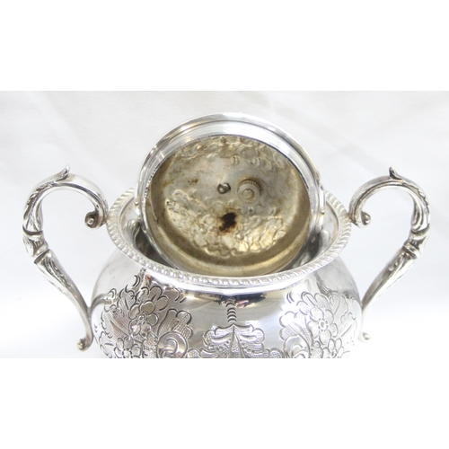 1056 - A highly decorated antique 4 piece silver-plated tea set to include tea pot, hot water jug, sugar an... 