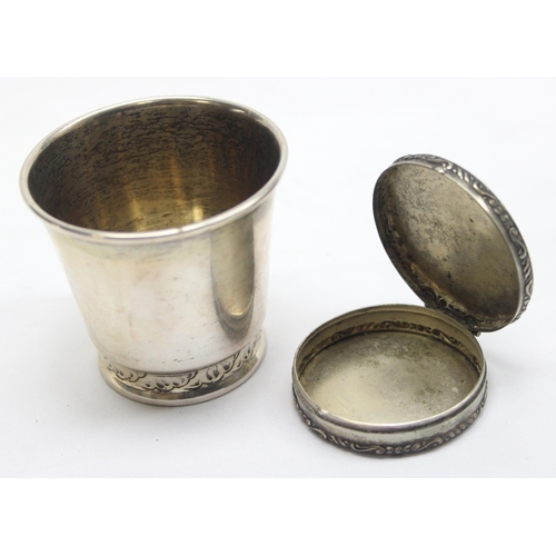 1061 - A small Danish silver beaker of plain form with decorative embossed details, marked for 1933, approx... 