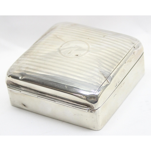 1067 - An Art Deco period silver cigarette box with pin stripe engraved top, marks rubbed, approx 170.06g g... 