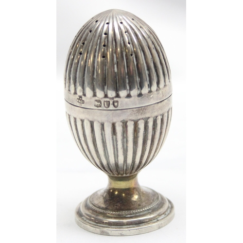 1070 - A decorative Victorian silver pepper pot of gadrooned egg shape, London 1895 by Horace Woodward & Co... 