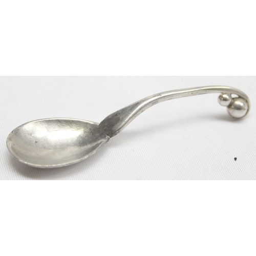 1073 - Georg Jensen of Denmark, a small silver salt or mustard spoon of naturalistic form, various marks in... 