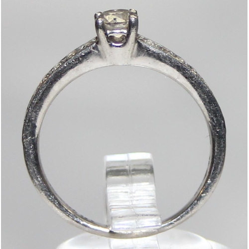 1104 - A Platinum and diamond ring, approx 0.52ct of diamonds in the solitaire and shoulders, marked and XR... 