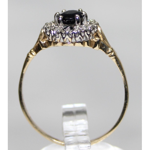 1105 - 9ct gold sapphire ring surrounded by small diamonds, marked and XRF confirmed, approx size U, approx... 