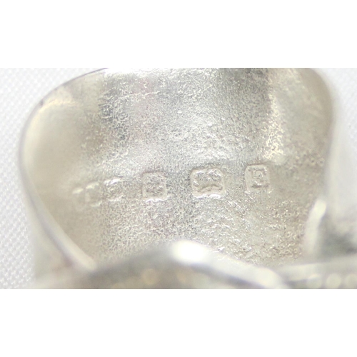 1117 - An unusual silver ring formed from a silver teaspoon, marked and XRF confirmed, approx size S