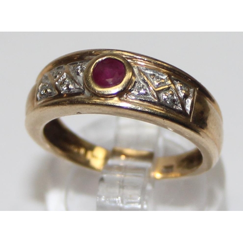 1121 - 9ct gold retro style ruby and diamond ring, a round central ruby flanked by small diamonds, marked a... 