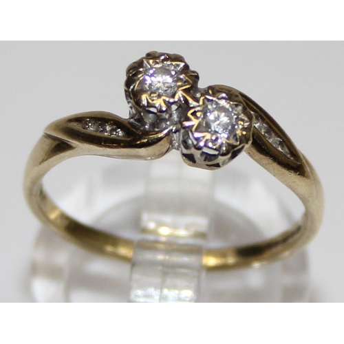 1130 - 9ct gold diamonds crossover ring, marked and XRF confirmed, approx size P, approx 2.55g gross