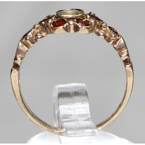 1131 - 9ct gold Georgian style floral set red and white stone ring, marked and XRF confirmed, approx size M... 