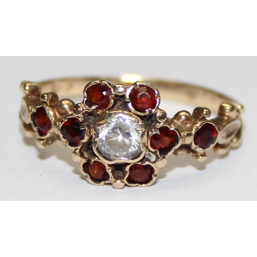 1131 - 9ct gold Georgian style floral set red and white stone ring, marked and XRF confirmed, approx size M... 