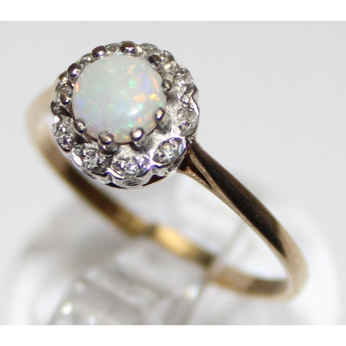 1134 - 9ct gold opal and diamond ring, marked and XRF confirmed, approx size M, approx 1.41g gross