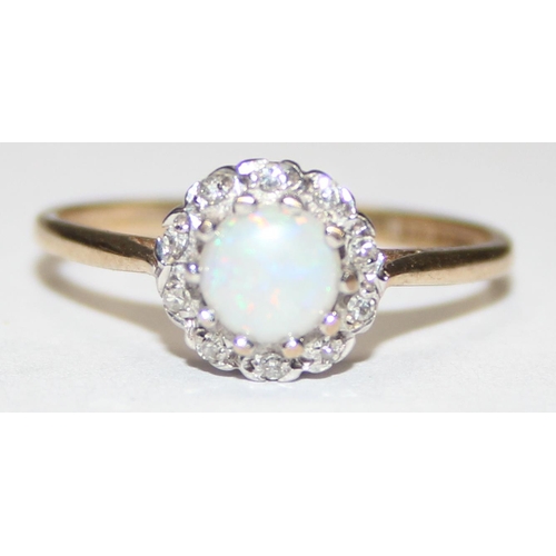 1134 - 9ct gold opal and diamond ring, marked and XRF confirmed, approx size M, approx 1.41g gross