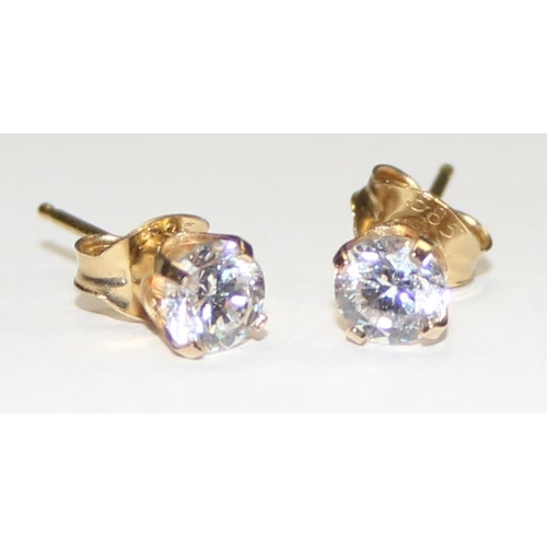 1137 - A pair of 14ct gold and white stone stud earrings, marked 585 to butterfly and both pieces XRF confi... 