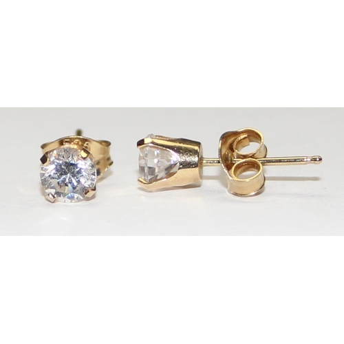 1137 - A pair of 14ct gold and white stone stud earrings, marked 585 to butterfly and both pieces XRF confi... 