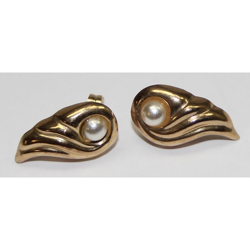 1138 - A pair of 9ct gold and faux pear earrings, formed as flaming pearls, unmarked but XRF confirmed, one... 