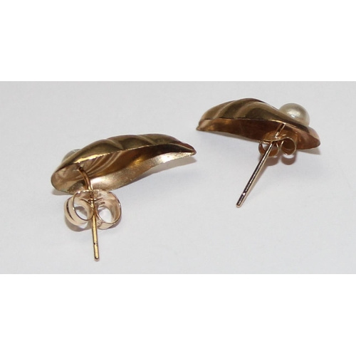 1138 - A pair of 9ct gold and faux pear earrings, formed as flaming pearls, unmarked but XRF confirmed, one... 