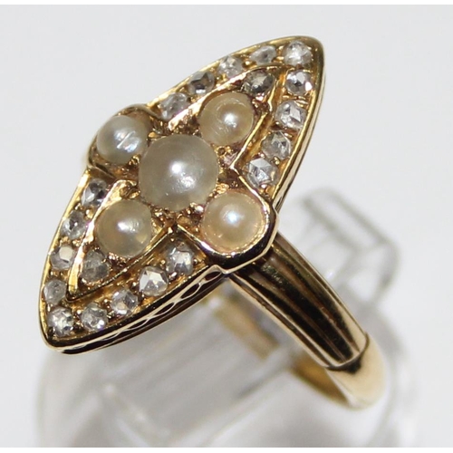 1156 - An unusual antique seed pearl and diamond set marquise shaped ring, unmarked but XRF tests approx 15... 