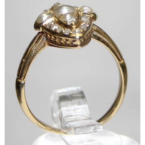 1156 - An unusual antique seed pearl and diamond set marquise shaped ring, unmarked but XRF tests approx 15... 