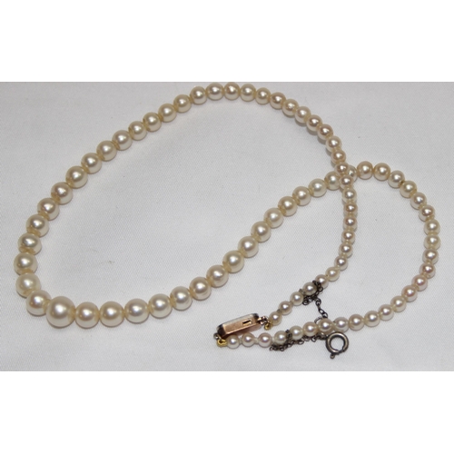 1162 - A vintage pearl necklace with diamond set 14ct gold clasp, the clasp unmarked but XRF tests as 14ct ... 