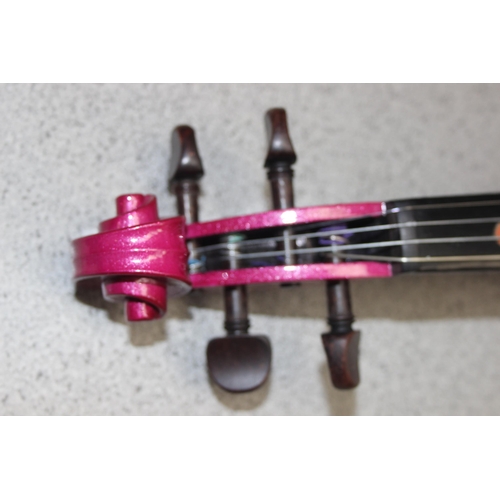 606 - 3/4 size pink 'Harlequin' violin in case by Stentor Music Co Ltd with bow